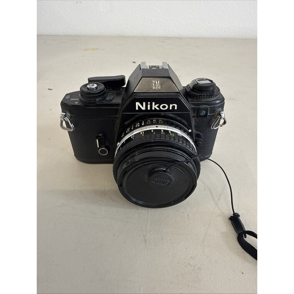 Nikon EM 35mm Film Camera w/ Zoom Lens 35-70mm Untested Vintage SLR